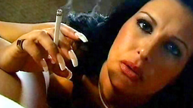 Smoking brunette likes to suck