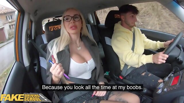 Tattooed Busty Blondie Bombshell takes young guy on a driving exam which ends with him cumming in her mouth - reality