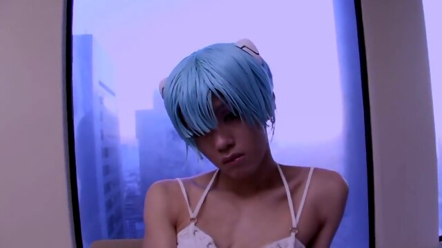 Japanese she-male in white fishnets and boots onanism