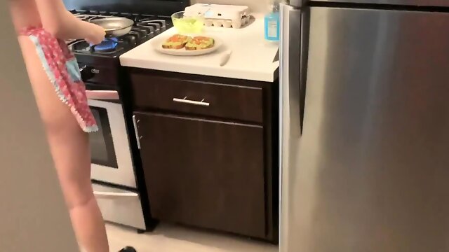 Mesmerizing brunette sucking off a big cock in the kitchen