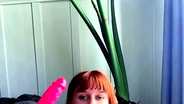 Stacked redhead milf using a big dildo to make herself cum