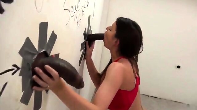Stacked milf satisfies her interracial lust at the gloryhole