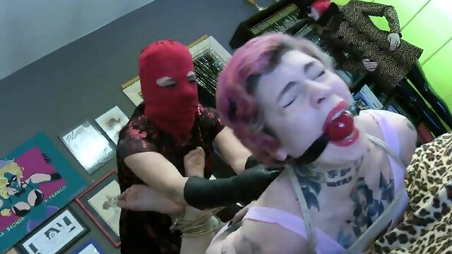 Tattooed mature wife bound and gagged by a masked stranger