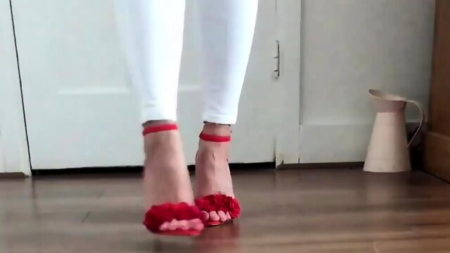 Dominant milf with sexy feet tries on her new red high heels