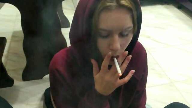 Young smoker sucks a big dick and takes it deep doggystyle