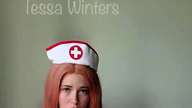 Enticing redhead teen in lingerie pleases herself on webcam