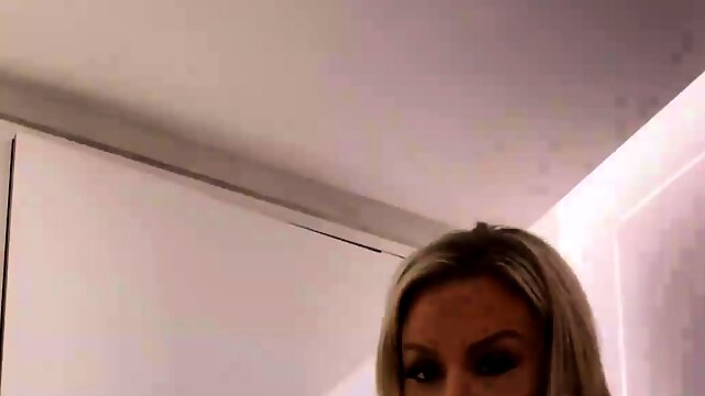 Bodacious blonde milf exposes her amazing big tits on webcam