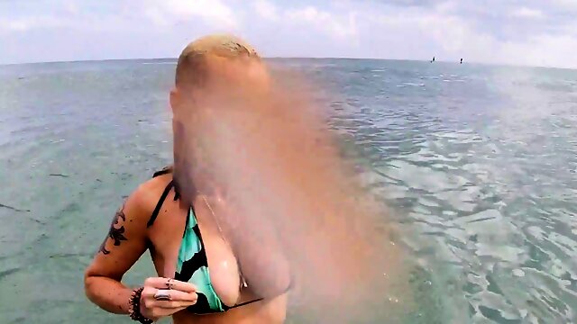 Naughty amateur blonde exposing her naked body under water