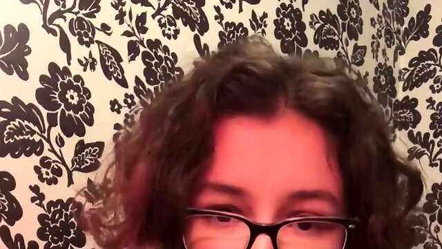 Nerdy amateur teen showing off her perky breasts on webcam