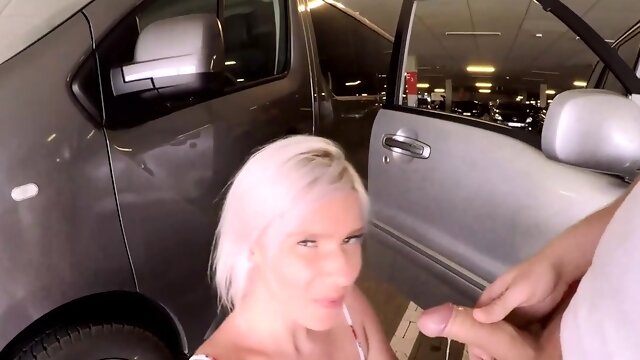 Sultry blonde milf gives a perfect blowjob in a public place