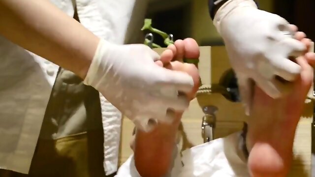 Helpless babe gets her marvelous feet caressed and tickled