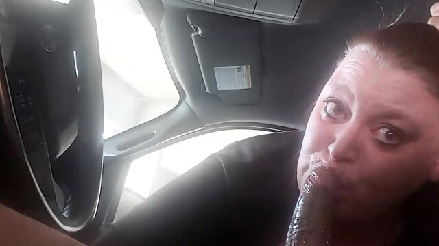 Curvy mature brunette takes a big black cock down her throat