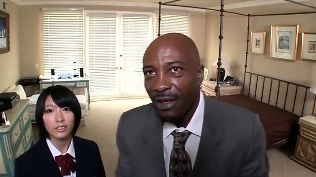 Pretty Japanese schoolgirl satisfies her interracial lust