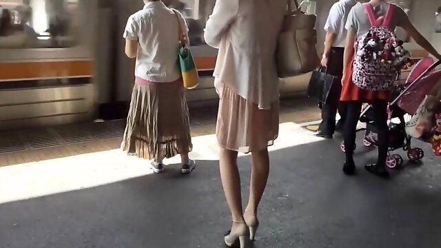 Beautiful Japanese girl in white panties upskirt in public