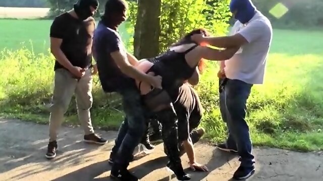 Curvy mature slut takes on a gang of cocks in the outdoors