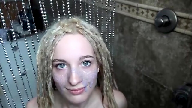 Alluring blonde teen shows off her sexy curves in the shower