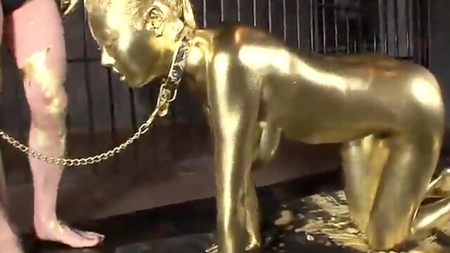 Submissive Asian slut painted in gold makes herself cum hard