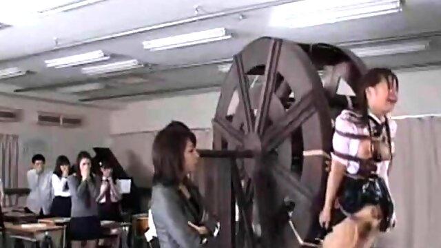 Kinky Asian schoolgirls getting trained on the water wheel