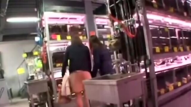 Pantyhosed Asian lady has a guy fingering her cunt in public 