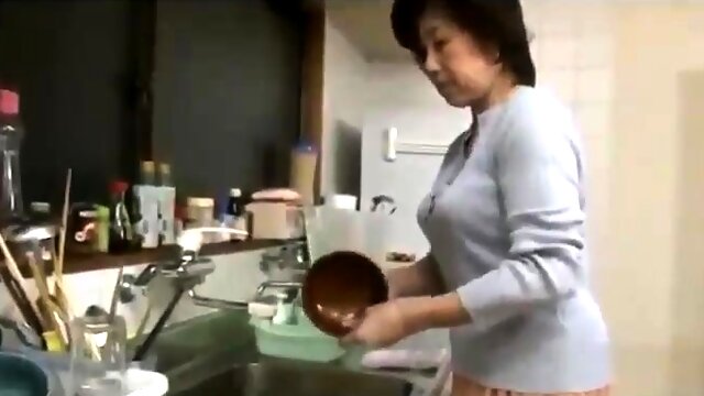 Mature Asian wife with big boobs is in need of a young cock