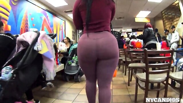 Big booty amateur babe in tight purple pants goes for a walk