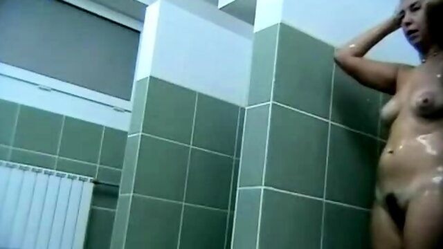 Hot busty on a voyeur video from the swimming pool showers