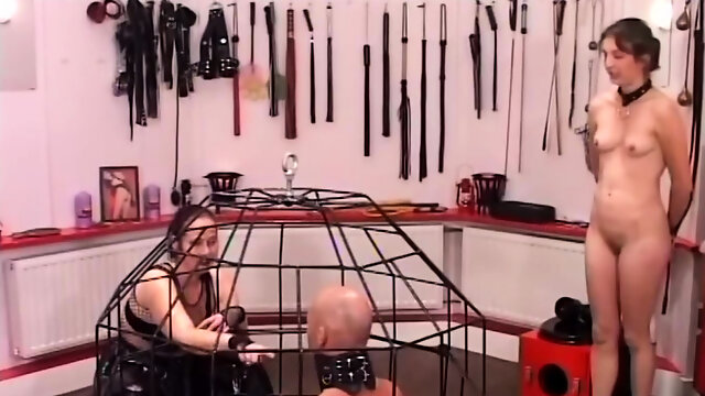 Caged slave getting humiliated by his merciless Mistress