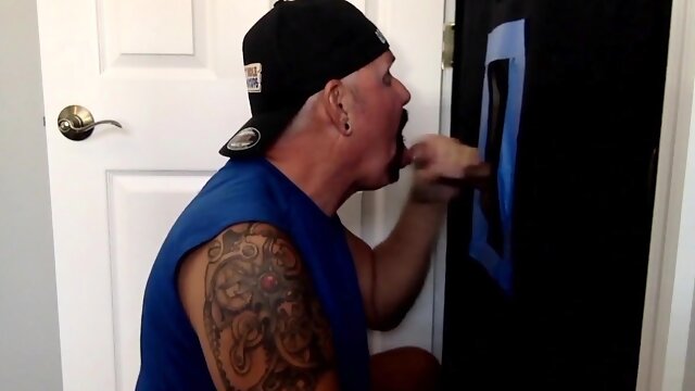 Mature DILF gobbling gloryhole cock