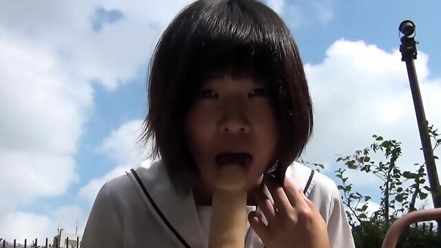 Asian teen rides dildo