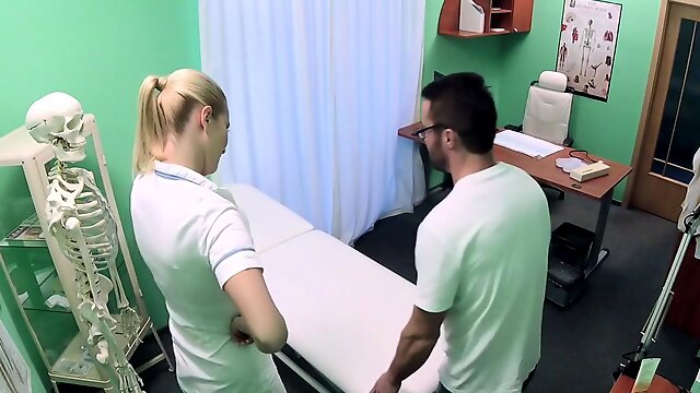 Handyman fucks nurse on exam table