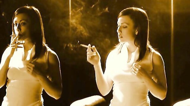 A couple of naughty girls love teasing you by smoking and p