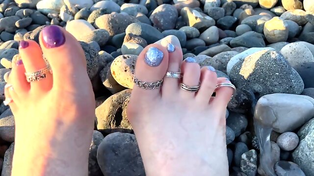 Hot and sexy feet of Mistress Lara in the sunset on public beach
