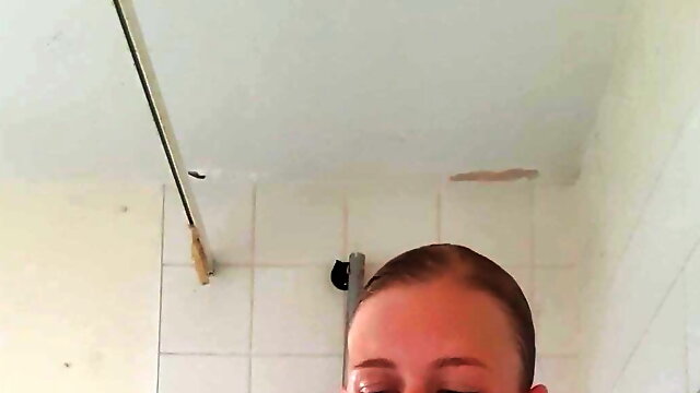 Hot blonde takes a shower