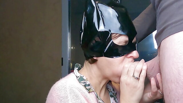 MILF catwoman gives close-up blowjob and swallows cum throbbing to play with next
