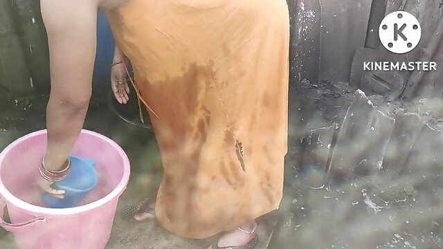 Anita yadav bathing outside with hot