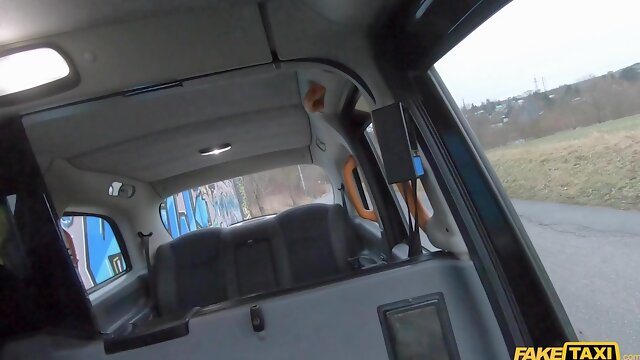 Silicone black slut with huge melons gets fucked in the taxi