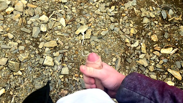 I jerk off a flaccid dick and cum on a mountain lake in nature! POV!