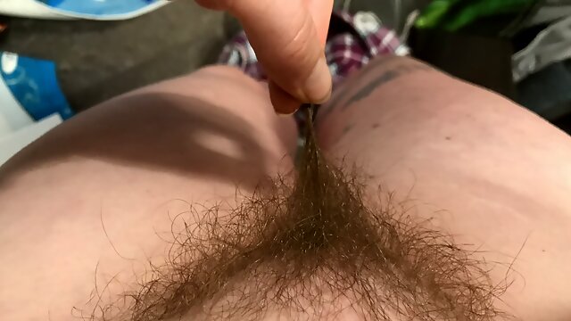 Horny housewife shows you exactly how to turn her on by running her fingers along her pubic hairs