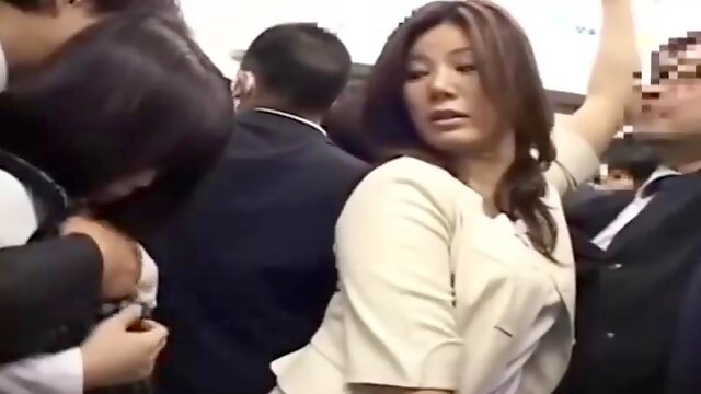 Tempting brunette Japanese lady in public place