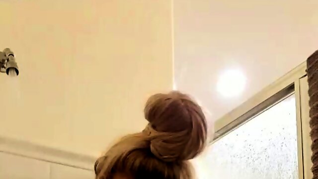 Tattooed blonde housewife playing with herself in the shower