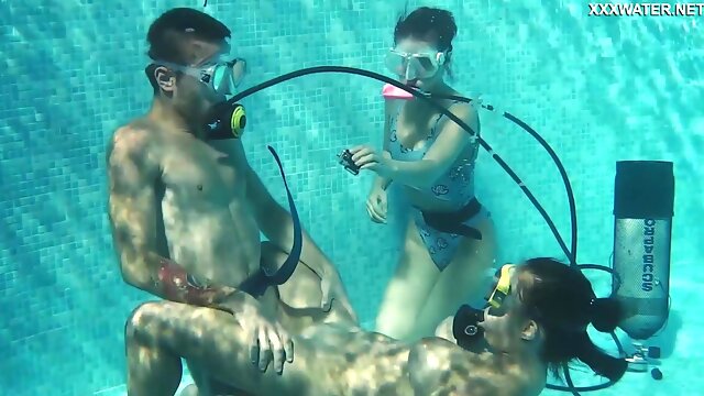 Diving instructor fucks nice babe in scuba Lizzy under the water