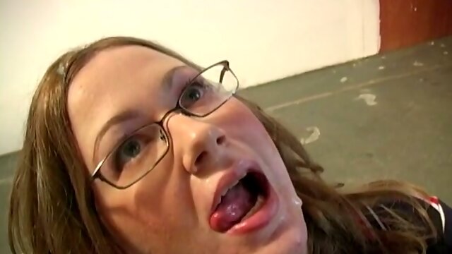 Lusty red haired chick in glasses Brandy Dallas gets her face jizzed