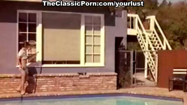 Vintage lesbians Kristara Barrington and Honey Wilder goes wild near the pool