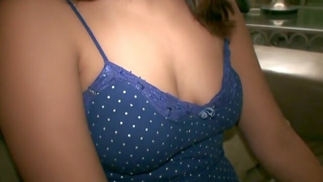 Smiling brunette cutie flashes her nice tits and gives solid blowjob