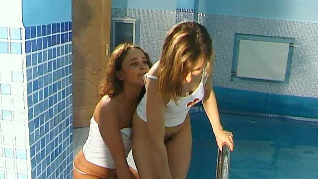 Extremely exciting lesbian threesome near the swimming pool