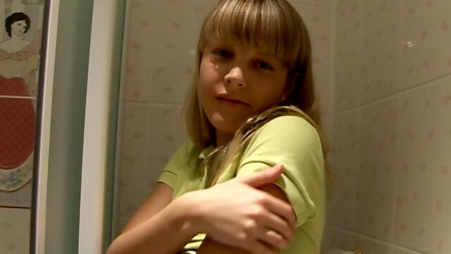 Ardent blond wanker Chanel masturbates with a dildo on the toilet bowl