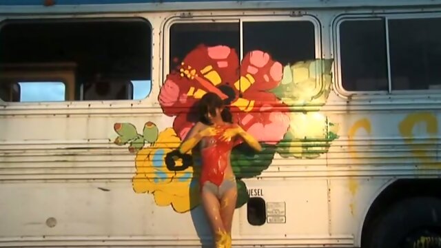 Japanese cutie Rika Sato paints a bus wearing nothing but sexy lingerie