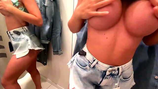 Slim bitch fucked in the fitting room while trying on new clothes!