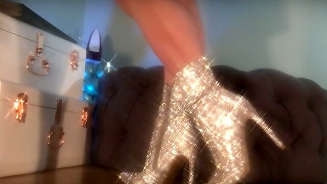 Sparkles Tease - Mesmerizing Goddess teases slaves in her Holiday Boots and uses a metronome