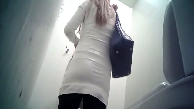 Cute white blonde teen in black panties filmed in the toilet